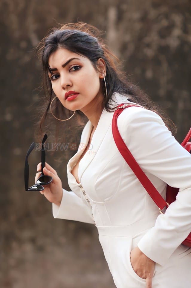 Sexy Komal Jha in a White Long Sleeve Corset Jumpsuit Pictures 07