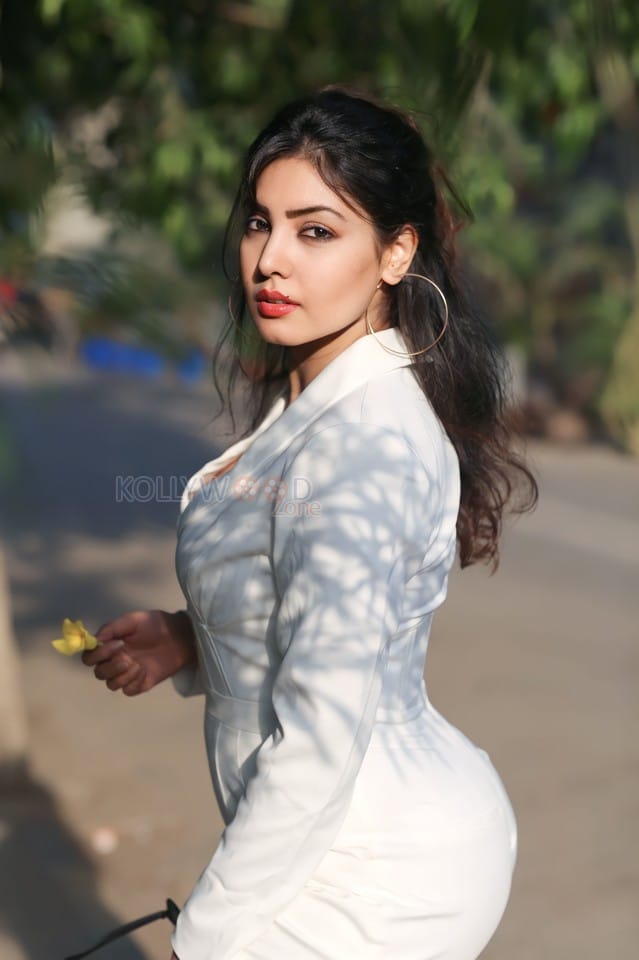 Sexy Komal Jha in a White Long Sleeve Corset Jumpsuit Pictures 08