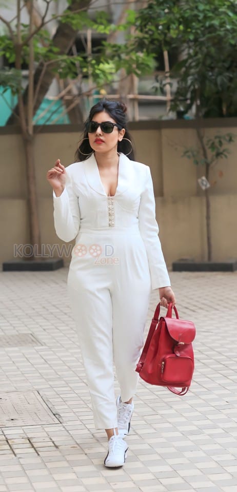 Sexy Komal Jha in a White Long Sleeve Corset Jumpsuit Pictures 09