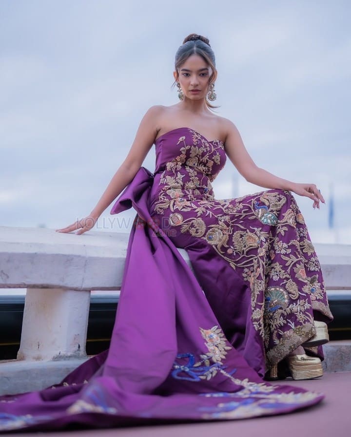 Young Beauty Anushka Sen in a Regal Wine Embroidered Strapless Gown at Cannes Film Festival Photos 03