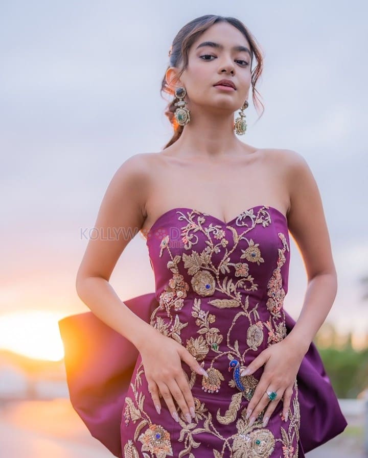 Young Beauty Anushka Sen in a Regal Wine Embroidered Strapless Gown at Cannes Film Festival Photos 04