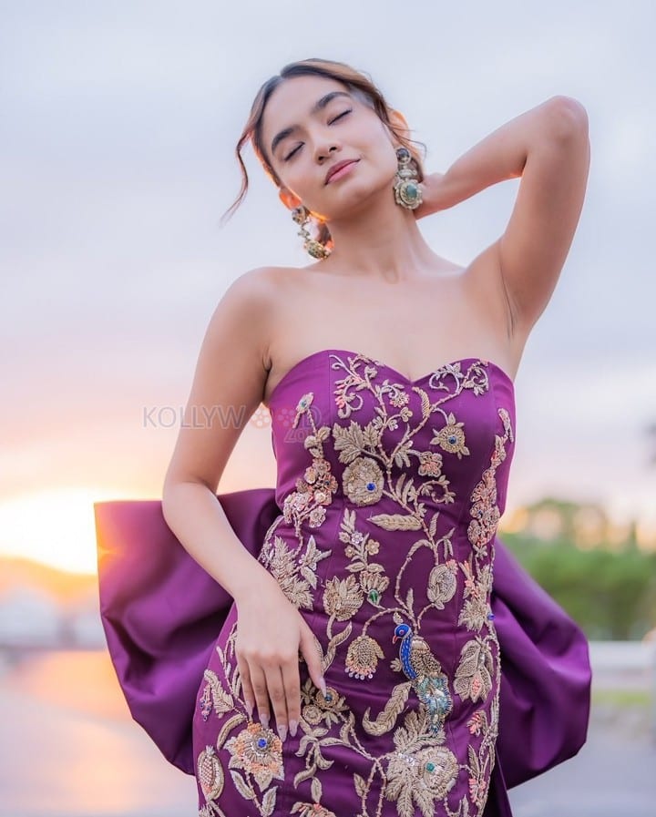 Young Beauty Anushka Sen in a Regal Wine Embroidered Strapless Gown at Cannes Film Festival Photos 06