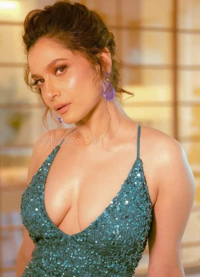 Bollywood Actress Ankita Lokhande Showing Cleavage in a Sexy Green Dress Photoshoot Pictures 02