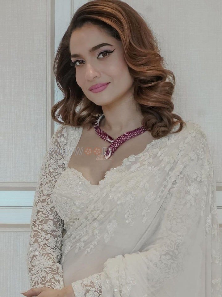 Elegant Ankita Lokhande in a White Lace Saree with a Sweetheart Neck Blouse Pictures 02