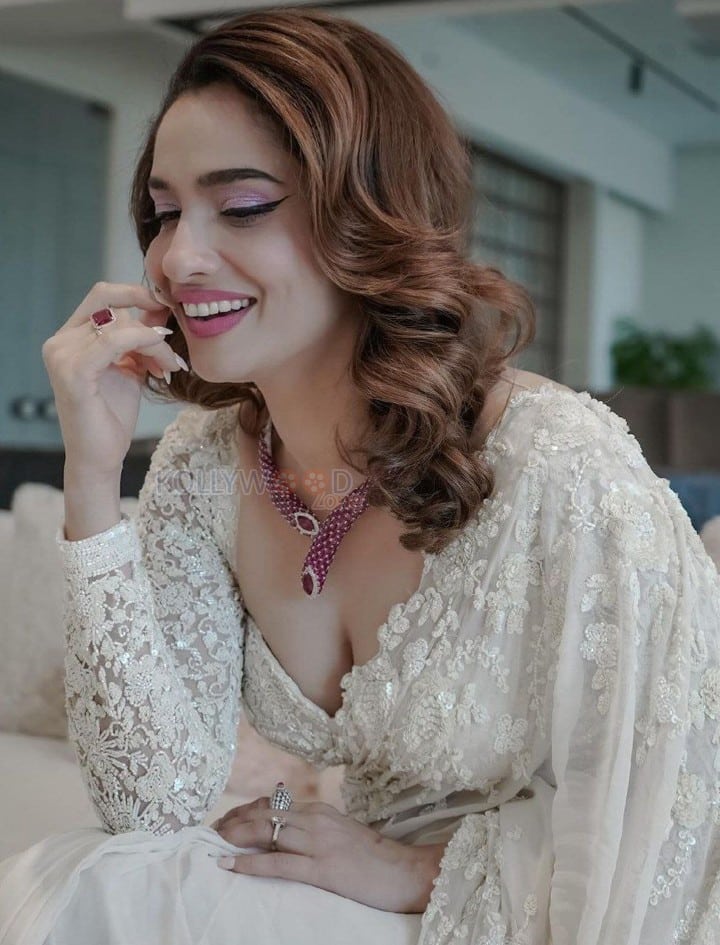 Elegant Ankita Lokhande in a White Lace Saree with a Sweetheart Neck Blouse Pictures 04