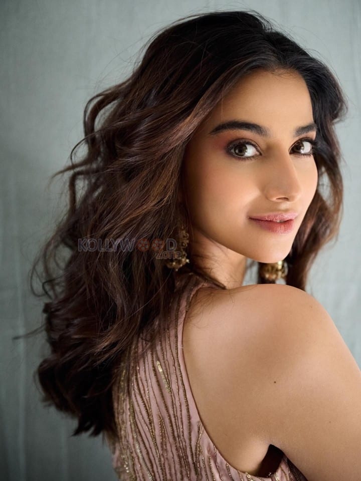 Beautiful Meenakshi Chaudhary in a Sleeveless Rose Gold Embroidered Co Ord Set Photos 04