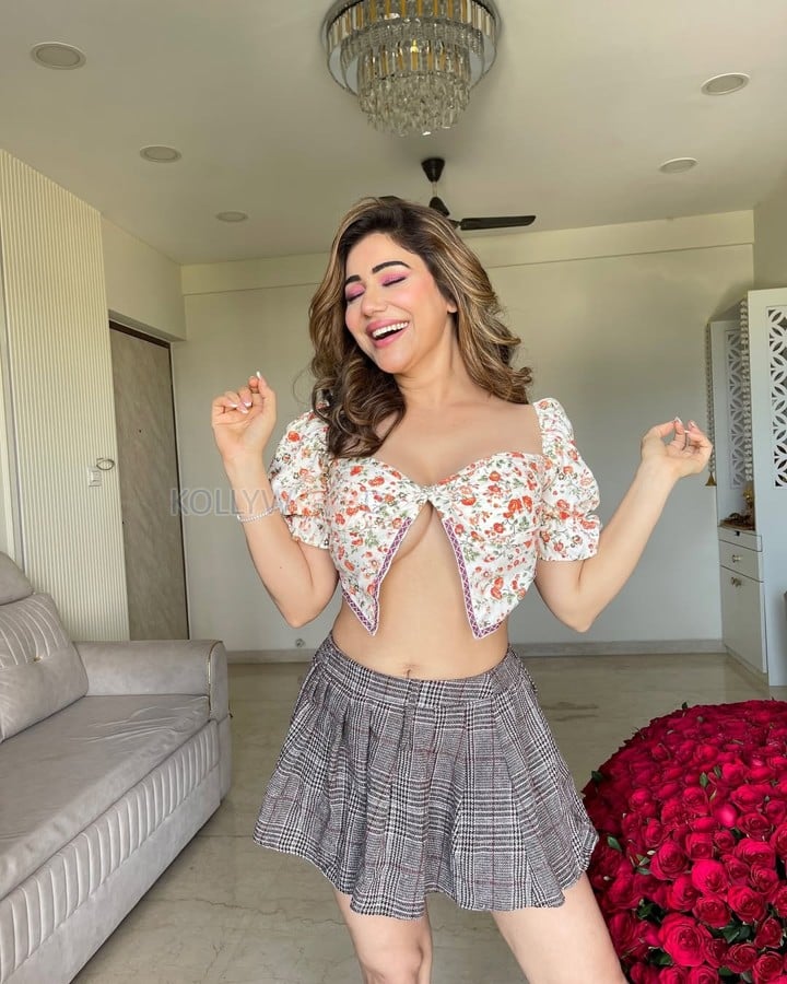 Sensual Kangna Sharma Topless in a Floral Crop Top and Pleated Mini Skirt Photos 02