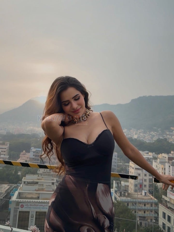 Beautiful Ashu Reddy in a Black Bustier Top with a Black and Brown Floral Printed Midi Skirt Photos 04