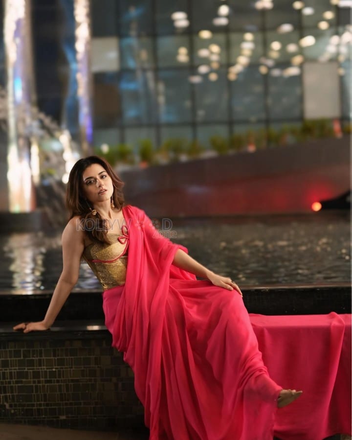 Glam Ridhi Dogra in a Vibrant Pink Saree with a Shimmering Golden Beige Corset Blouse Photos 06