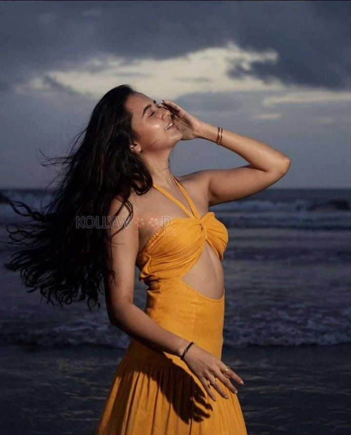 Beachside Glam Tejasswi Prakash in a Yellow Halter Maxi Dress Photos 02