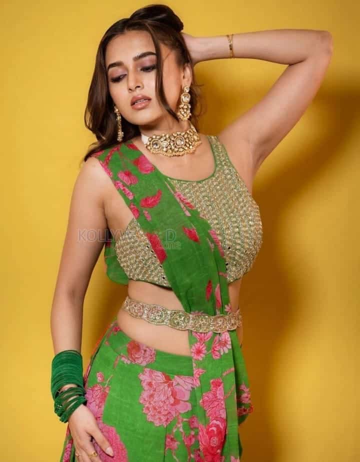 Beautiful Tejasswi Prakash in a Green Floral Lehenga Photos 02