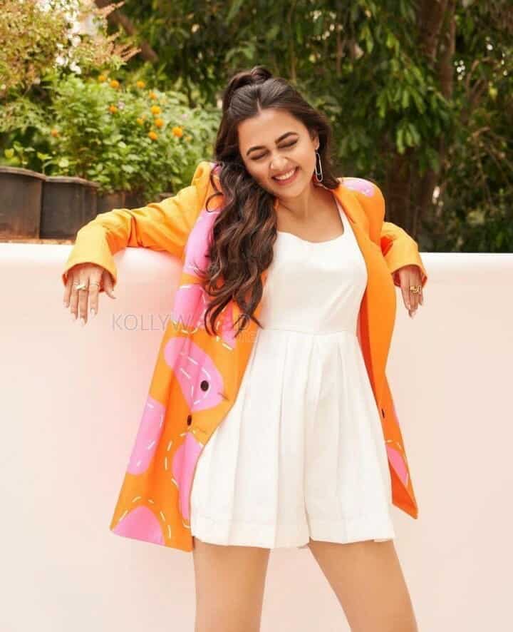 Beautiful Tejasswi Prakash in a White Dress and Orange Blazer Photoshoot Pictures 02