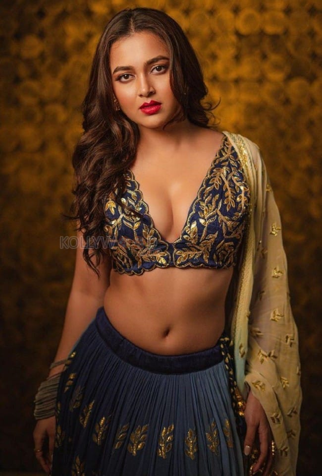 Her Hotness Tejaswi Prakash in a Navy Color Embroidered Lehenga Photos 02