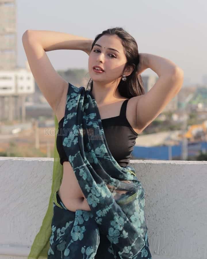 Sexy Vedvika Soni in a Embroidered Satin Half Saree with Black Crop Top Blouse Photos 06