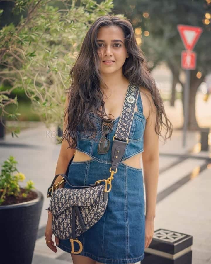 Stylish Tejasswi Prakash in a Denim Top and Mini Denim Skirt Photos 02