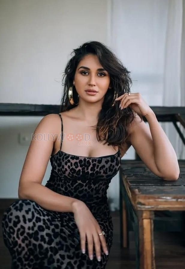 Gul Gule Bakawali Actress Nikita Dutta in a Black Leopard Print Slip Dress with Thin Spaghetti Straps Photos 03