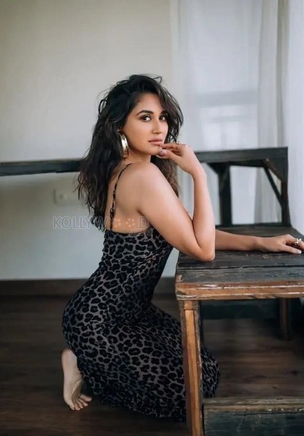 Gul Gule Bakawali Actress Nikita Dutta in a Black Leopard Print Slip Dress with Thin Spaghetti Straps Photos 04