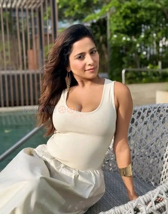 Bold and Sexy Kate Sharma in a Sleeveless Ribbed Tank Top with a Marching Skirt Pictures 04