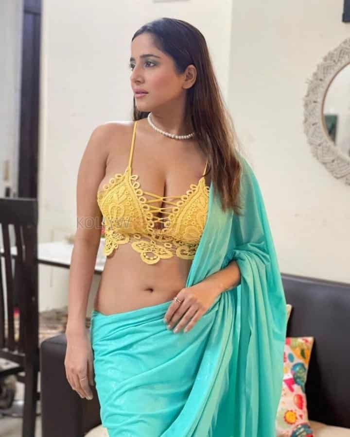Glamorous Kate Sharma in a Blue Saree and Deepneck Bralette Top Photos 01
