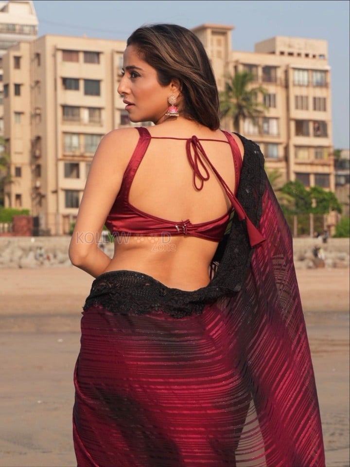 Hot Kate Sharma in a Maroon Saree with Matching Sleeveless Blouse Photos 09
