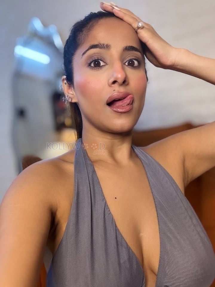 Sensual Kate Sharma Cleavage in a Deep V Neck Halter Style Sleeveless Crop Top and Jeans Photos 01