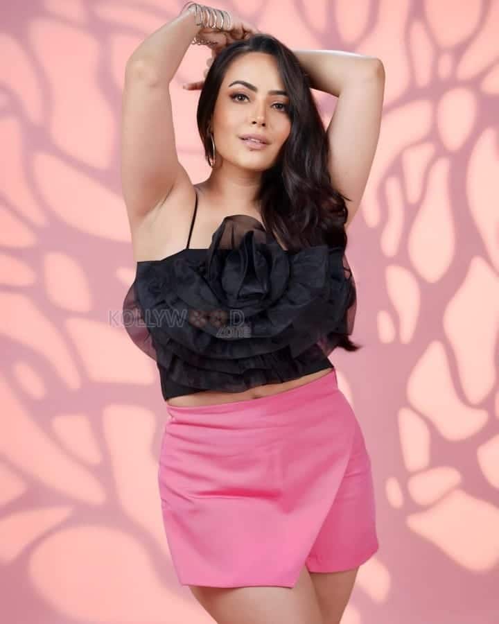 Sexy Aanchal Munjal in a Black Satin Top and Pink Mini Skirt Pictures 02