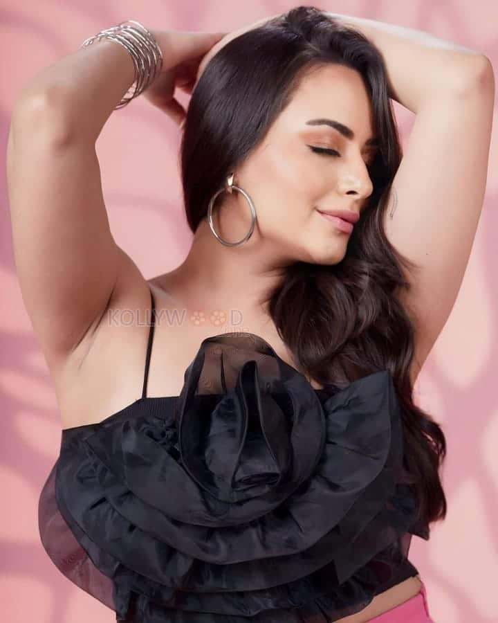 Sexy Aanchal Munjal in a Black Satin Top and Pink Mini Skirt Pictures 04