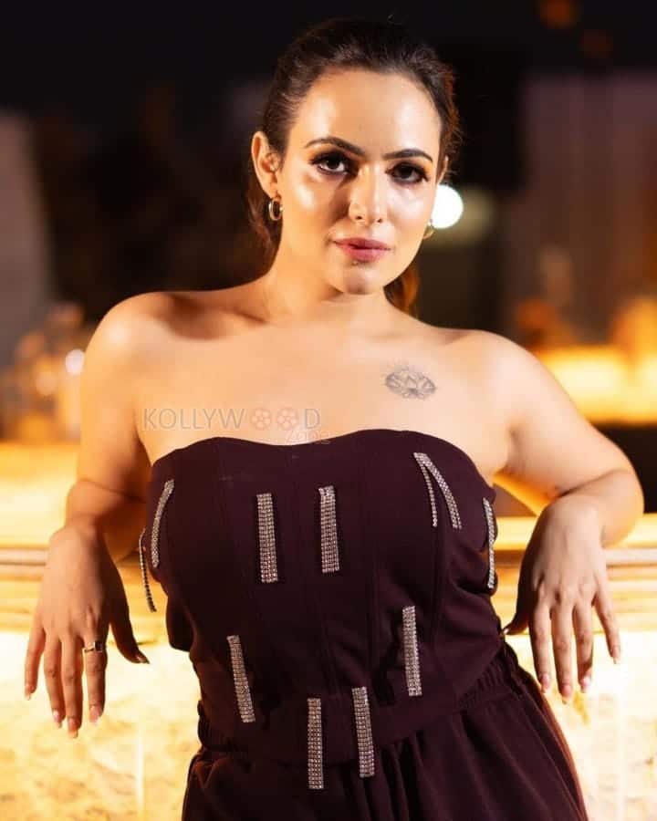 Stylish Aanchal Munjal in a Black Off Shoulder Dress Photos 02