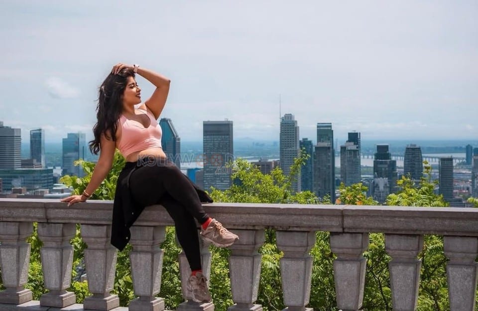 Beautiful Nikita Sharma in a Light Pink Sports Bra and Black Leggings Photos 03