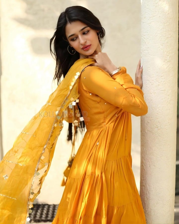 Beautiful Prakriti Pavani in a Mustard Yellow Sequin Embroidered Anarkali Set Photos 01