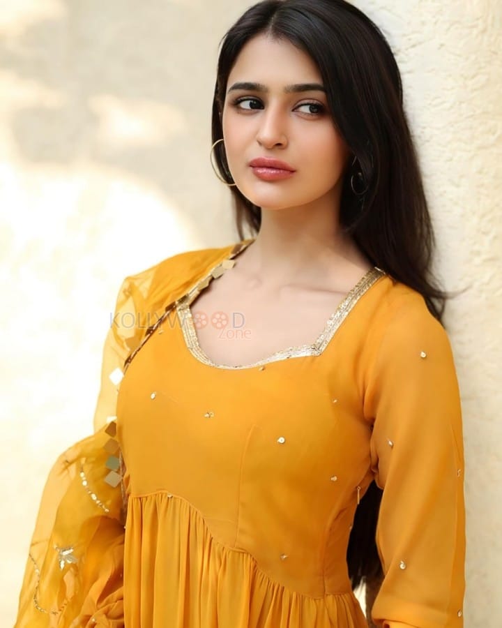 Beautiful Prakriti Pavani in a Mustard Yellow Sequin Embroidered Anarkali Set Photos 02