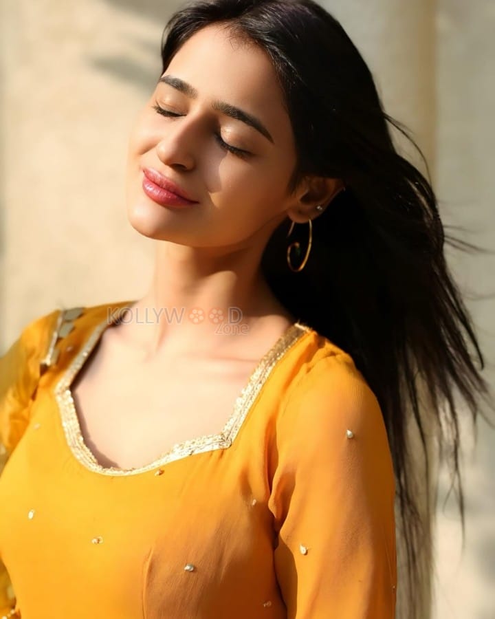 Beautiful Prakriti Pavani in a Mustard Yellow Sequin Embroidered Anarkali Set Photos 04