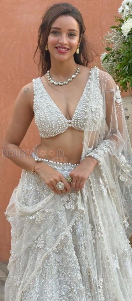 Elegant Tripti Dimri in a White Lehenga Photos 02