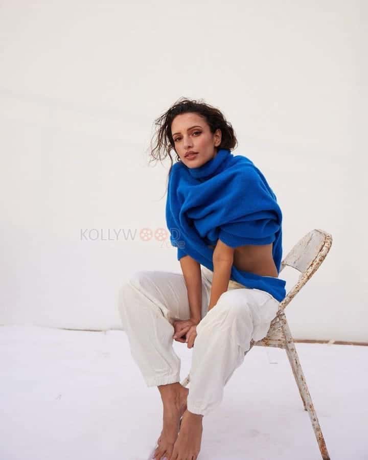 Glam Tripti Dimri Showing Navel in a Blue Sweater Photos 07