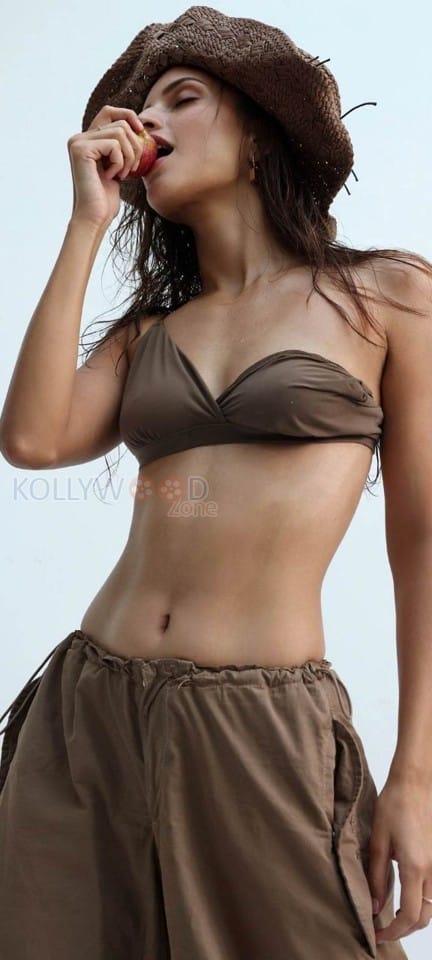 Gorgeous Tripti Dimri Eating Apple in a Chocolate Bikini Photos 01