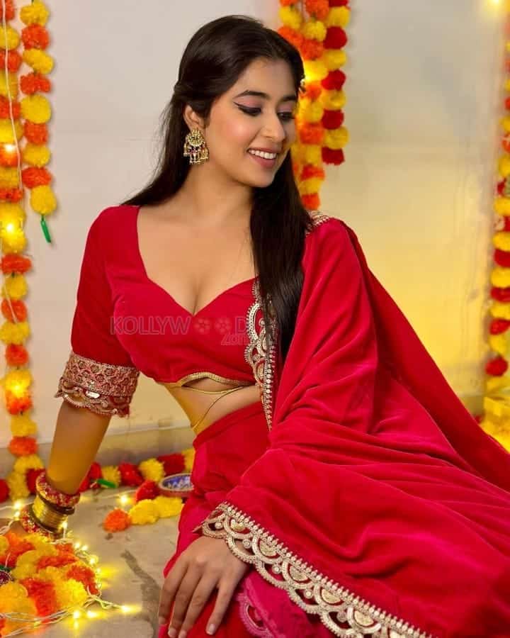 Hot Nikita Sharma in a Red Lehenga Choli Pictures 01