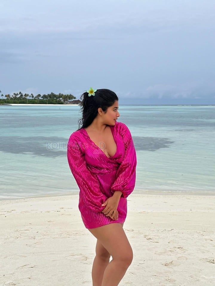 Indian Beauty Nikita Sharma in a Pink Mini Dress with Long Sleeves Pictures 02