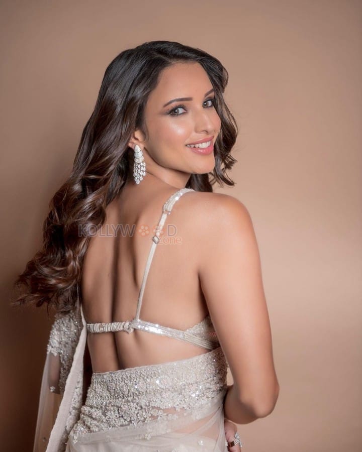 Qala Heroine Tripti Dimri in a White See Through Embellished Saree with a White Sequin Bralette Photos 05