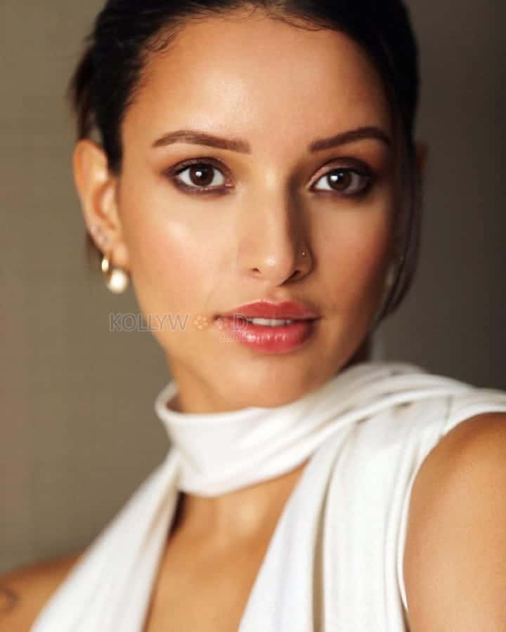 Ravishing Tripti Dimri in a White Cut Out Dress Pictures 03