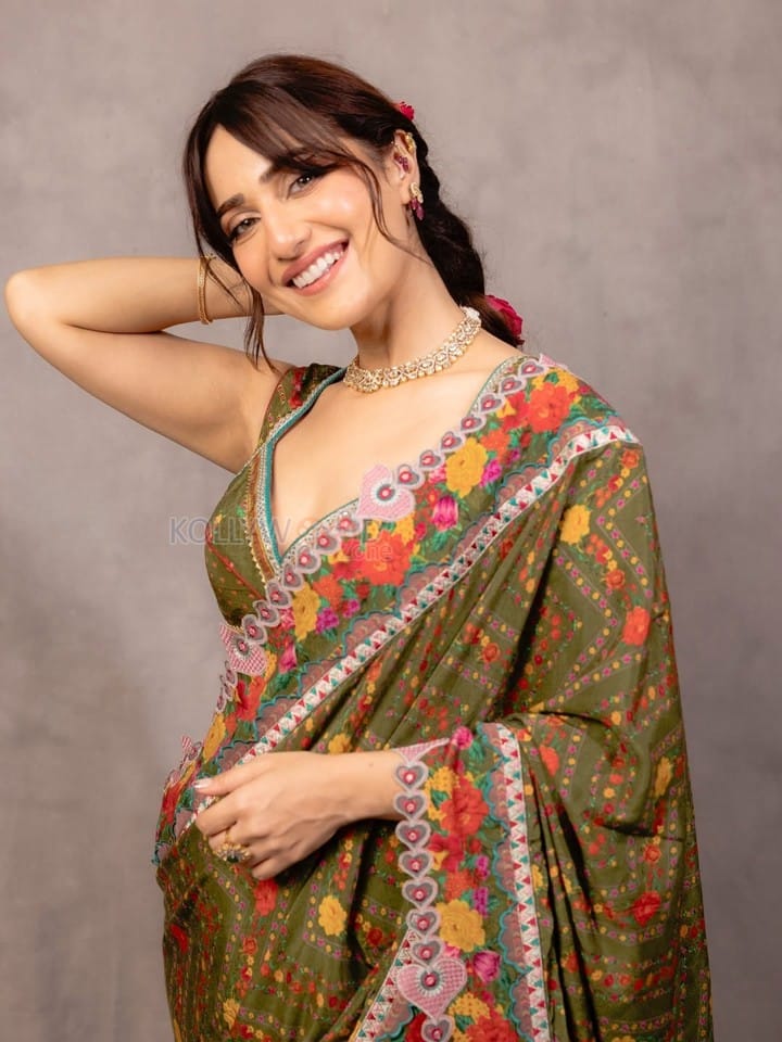 Stunning Kusha Kapila in a Green Silk Saree with Floral Embroidery and Sleeveless Blouse Photos 01