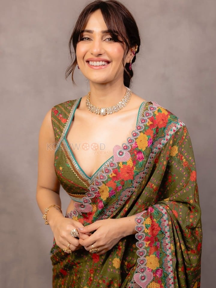 Stunning Kusha Kapila in a Green Silk Saree with Floral Embroidery and Sleeveless Blouse Photos 02