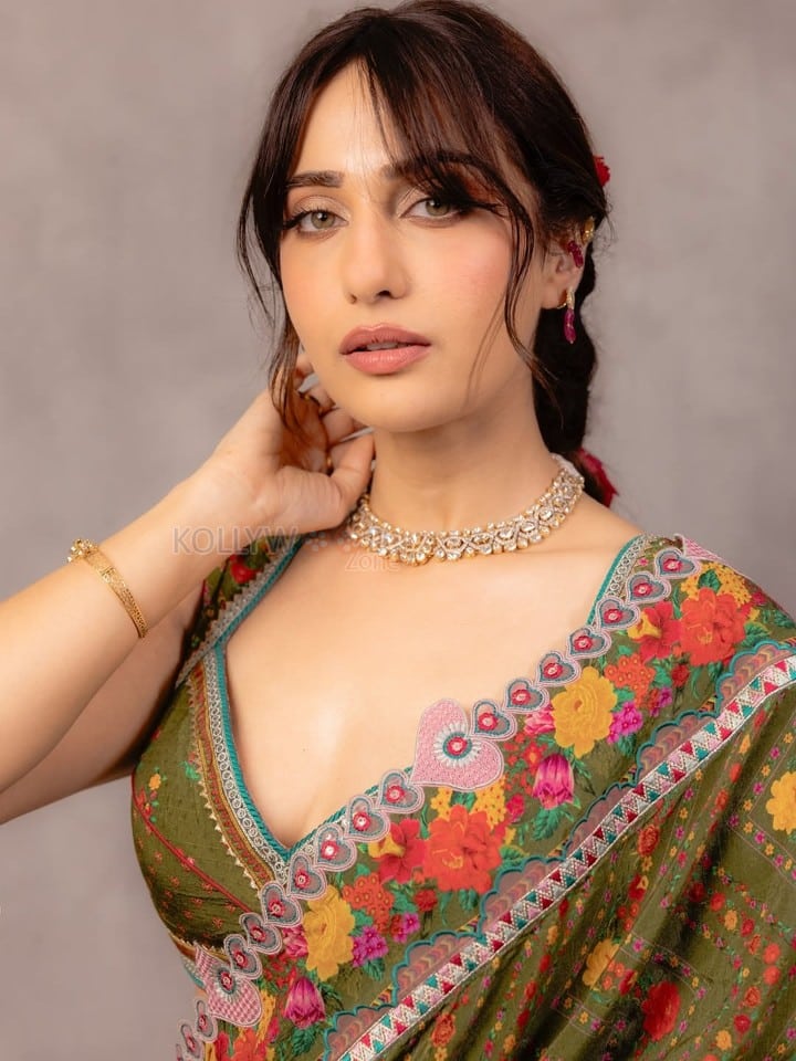 Stunning Kusha Kapila in a Green Silk Saree with Floral Embroidery and Sleeveless Blouse Photos 03