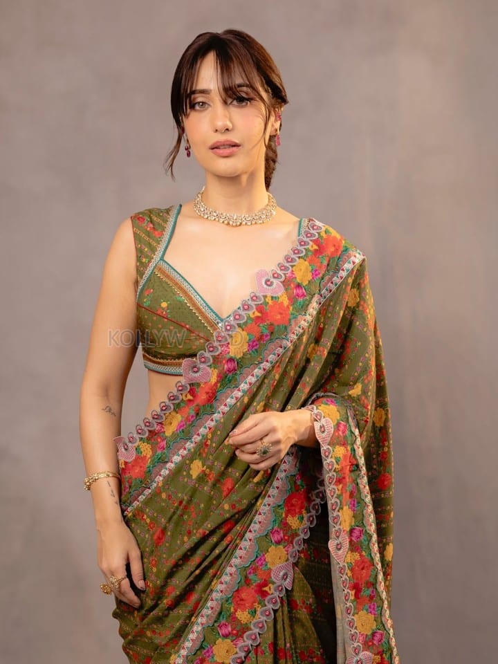 Stunning Kusha Kapila in a Green Silk Saree with Floral Embroidery and Sleeveless Blouse Photos 04