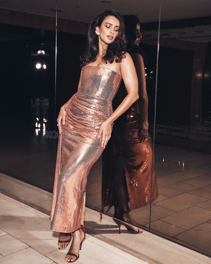 Stunning and Sexy Tripti Dimri in a Strapless Rose Gold Sequin Bodycon Dress Photos 05