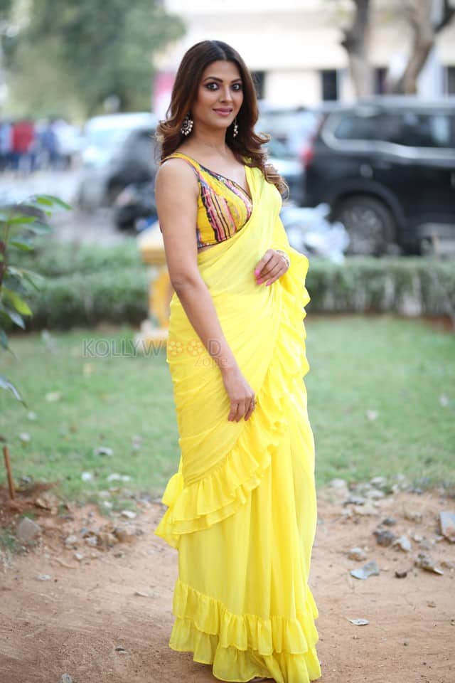 Actress Kashishh Rajput in a Yellow Saree with a Sleeveless Blouse Photos 01