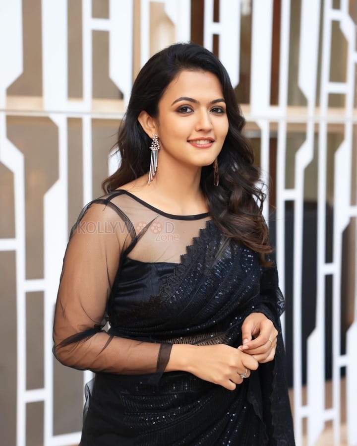 Beautiful Aparna Das in a Black Crystal Saree with Transparent Sleeveless Blouse Pictures 01