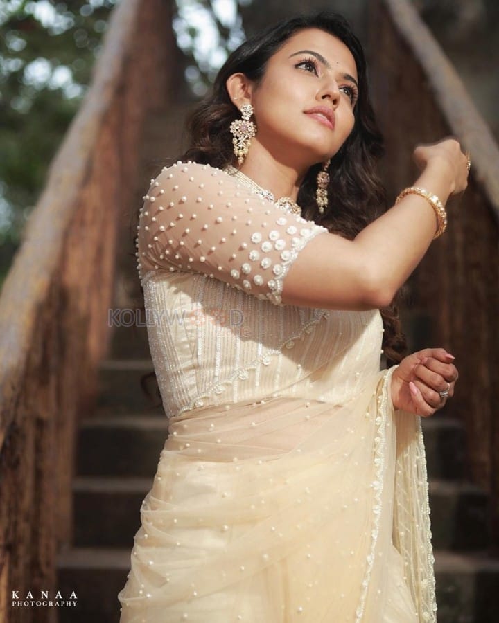 Dada Movie Actress Aparna Das in a Beige Saree with Pearl Work Blouse Photos 02