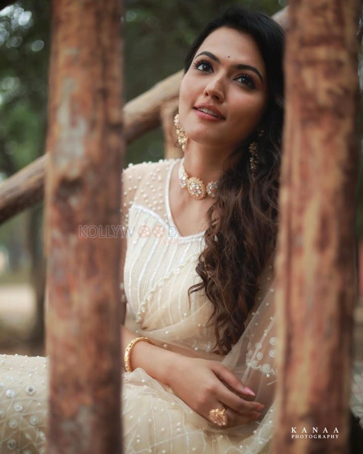 Dada Movie Actress Aparna Das in a Beige Saree with Pearl Work Blouse Photos 03