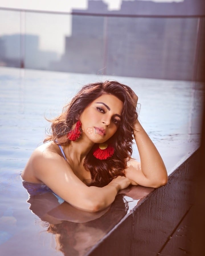 Enchanting Shama Sikandar in a Blue Designer Monokini Photos 02