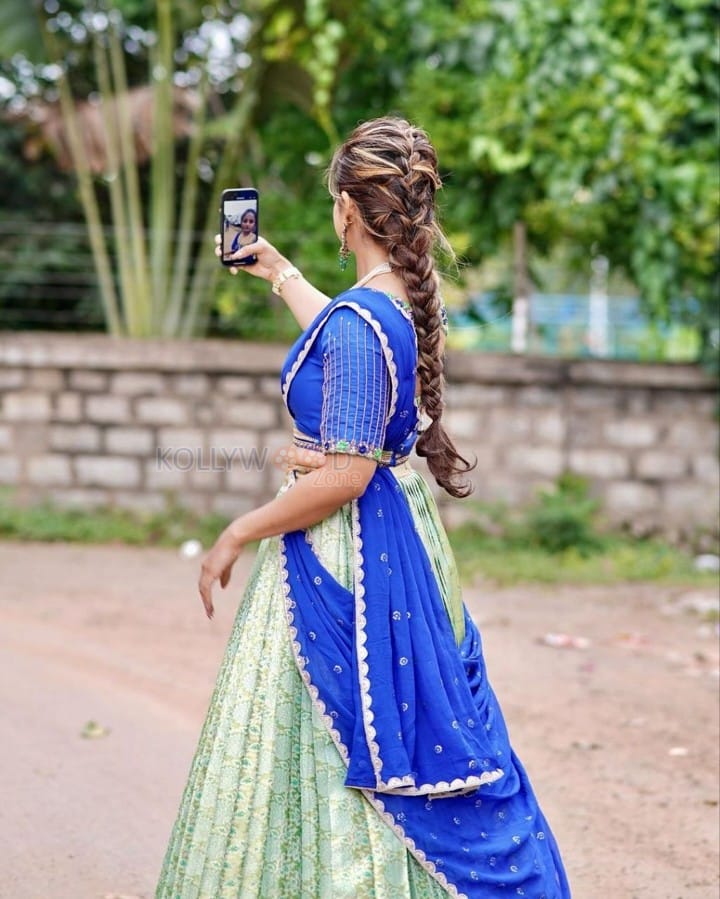 Chaitra Vasudevan in a Blue Half Saree Photoshoot Pictures 05